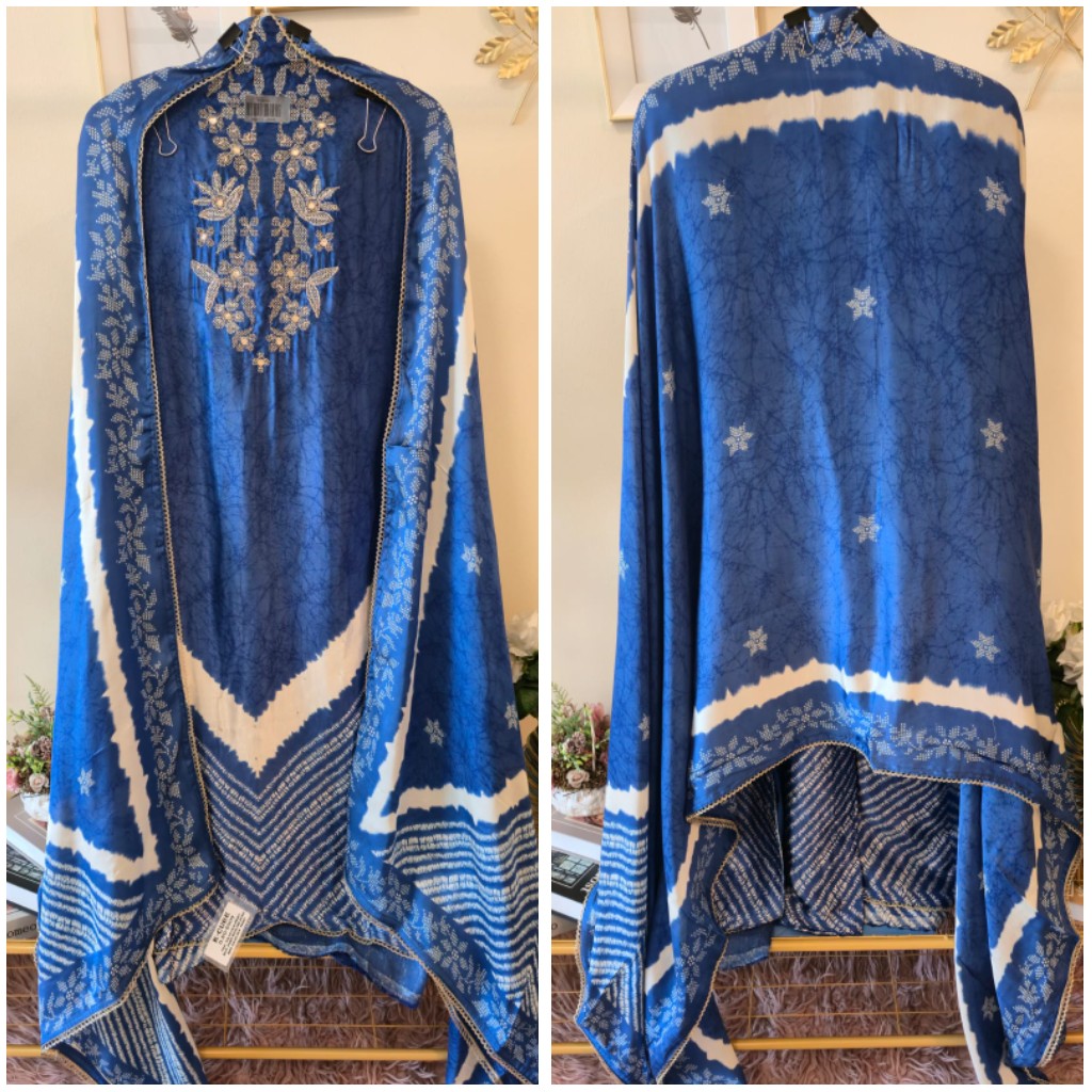 Crafted current blue pure gaji silk unstiched three peice suit.