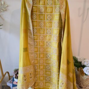 Turmeric yellow pure patola unstich three peice Silk Suit with Multicolor Heritage Print